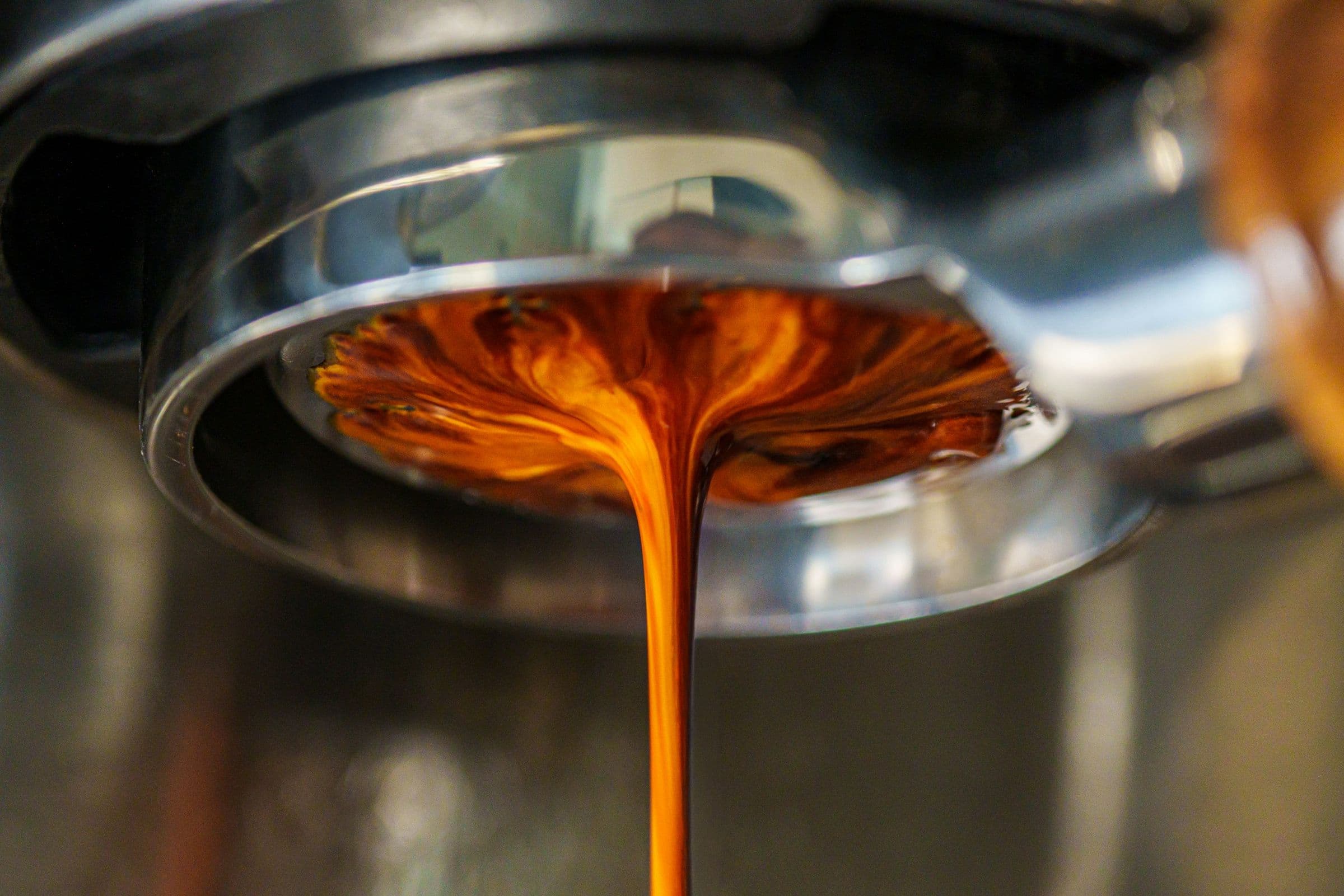 Espresso running from a bottomless portafilter